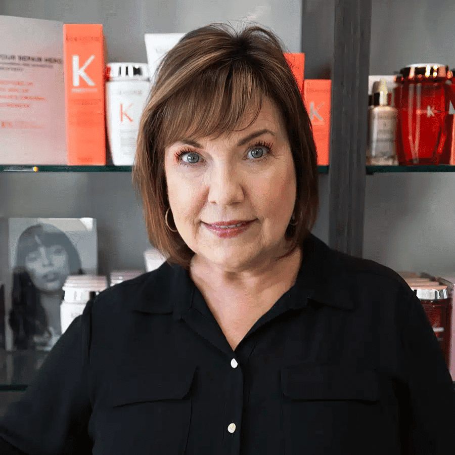 Portrait of Denise Acevedo, a professional stylist at The Beauty Lounge Salon + Blow Dry Bar, showcasing their expertise and style.