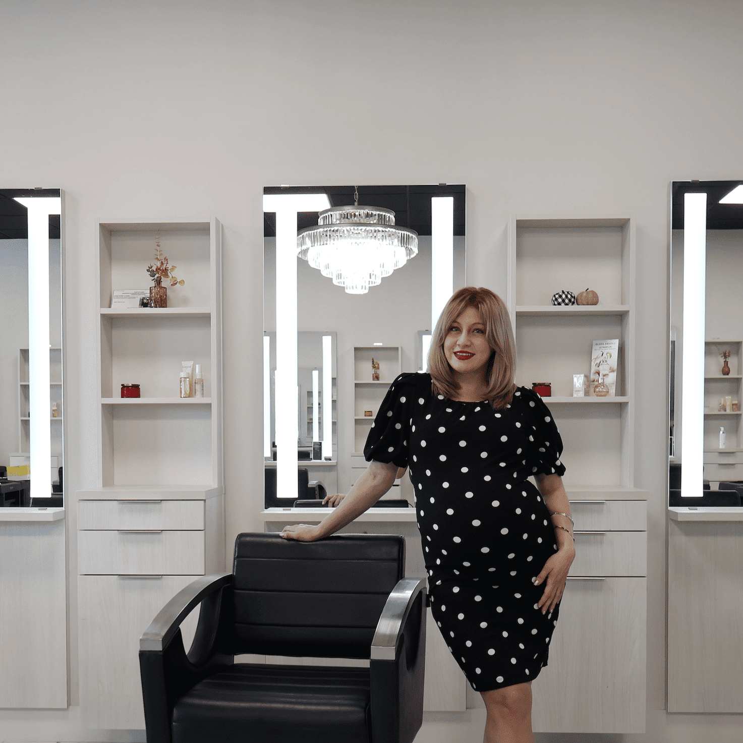 Portrait of Jasmine Vanegas, a professional stylist at The Beauty Lounge Salon + Blow Dry Bar, showcasing their expertise and style.