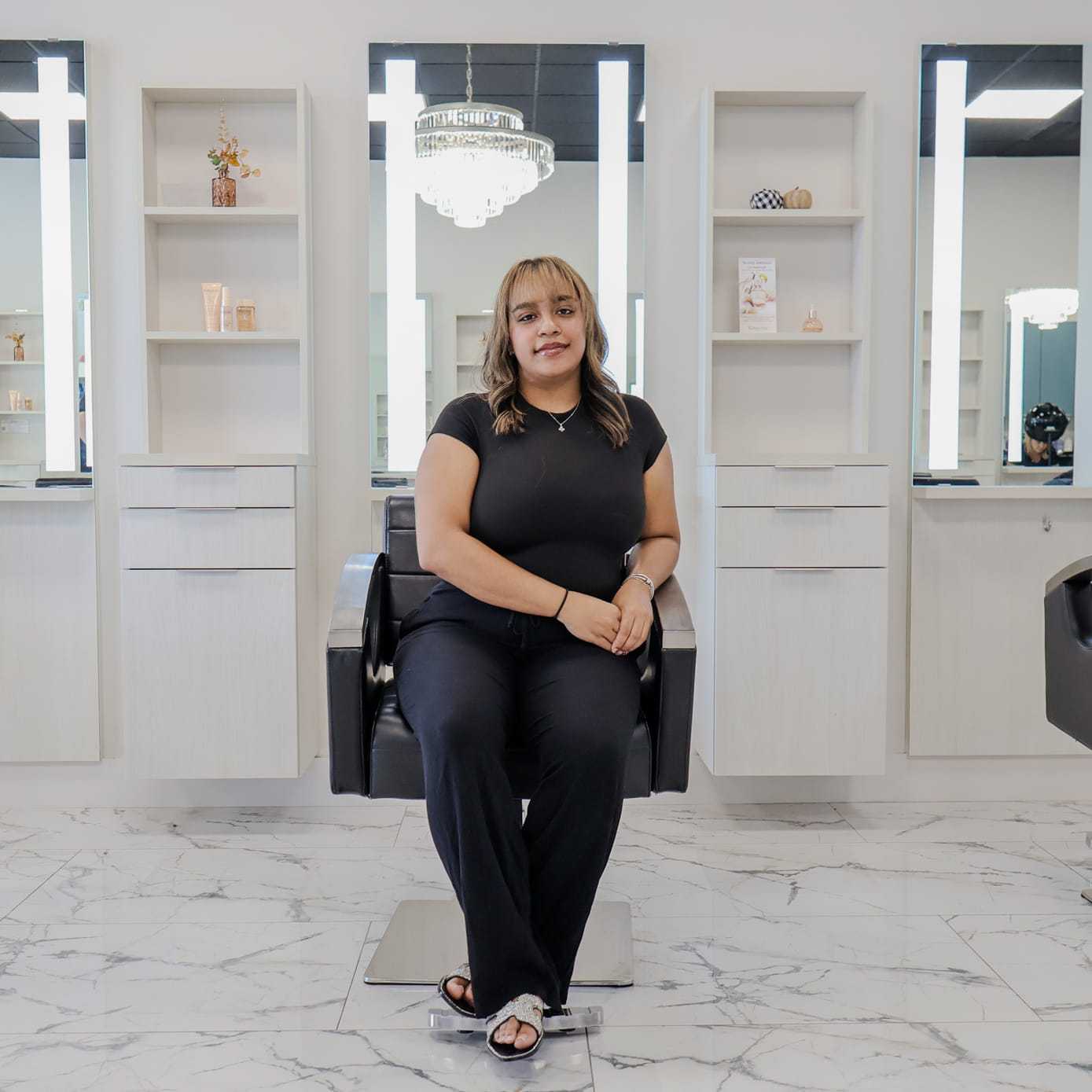 Portrait of Monica Ramirez, a professional stylist at The Beauty Lounge Salon + Blow Dry Bar, showcasing their expertise and style.